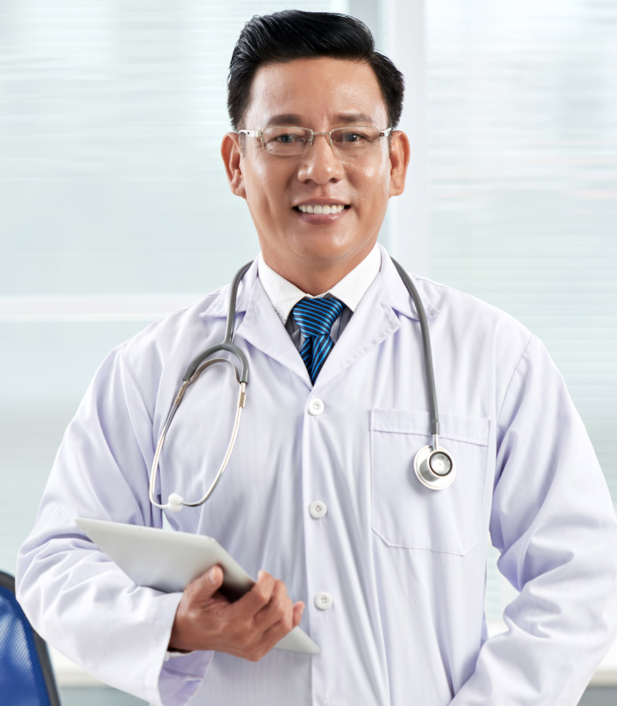 confident-doctor-looking-camera-holding-tablet-pc
